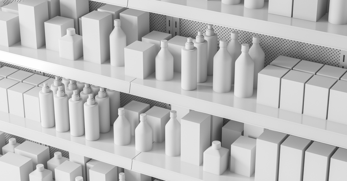 Supermarket shelves with different packages on them. The packages are blank white with no branding on any of them.